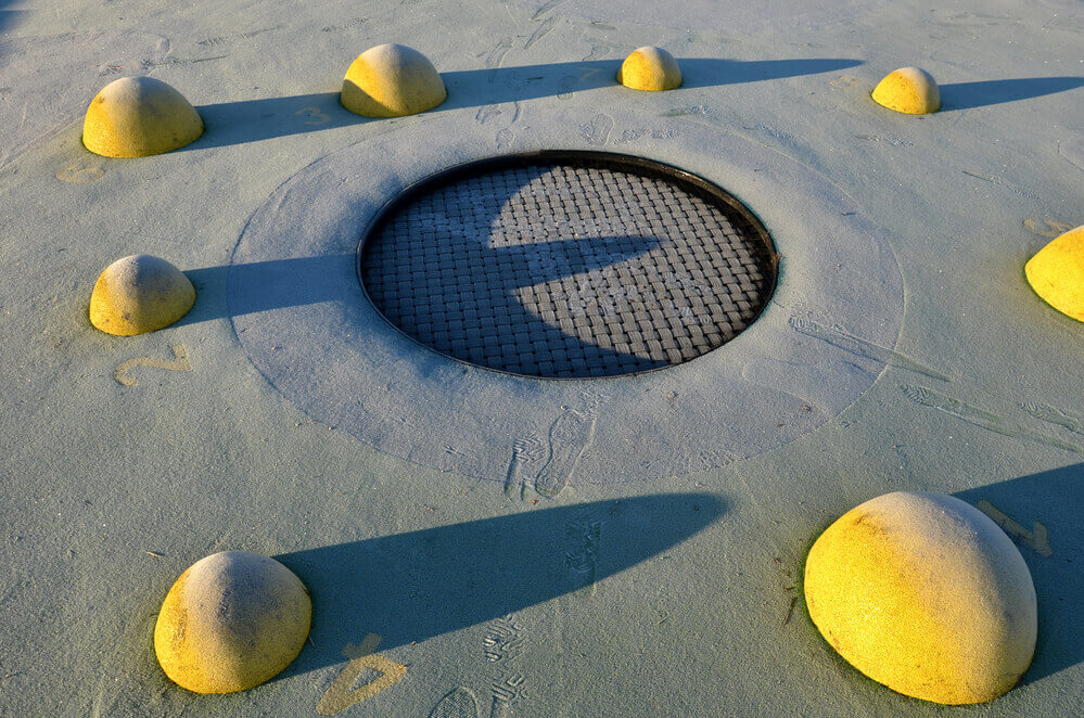 in-ground trampoline in a public garden