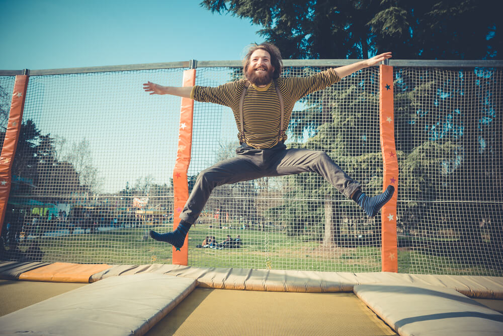 Man jumping on trampoline